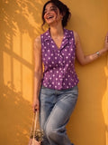 A Chic Sleeveless Printed Top With A Collared V-Neck Design, Perfect For Effortless Casual And Summer Styling.
