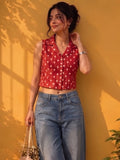 A Chic Sleeveless Printed Top With A Collared V-Neck Design, Perfect For Effortless Casual And Summer Styling.