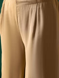 C Cut Kurta-Trouser Set Featuring Delicate Thread And Bead Embroidery, Paired With Flared Solid Trousers For A Chic And Comfortable Ethnic Ensemble