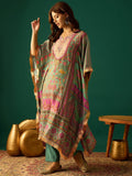 Kaftan-Style Kurta With A V-Neck, Paired With Solid Ankle-Length Trousers For A Relaxed Yet Elegant Look