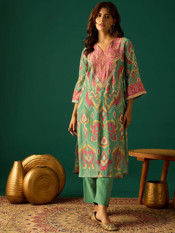 Elegant Sea Green Ikat Printed Straight-Fit Kurta With A V-Neck, Paired With Solid Ankle-Length Trousers For A Refined Ethnic Look
