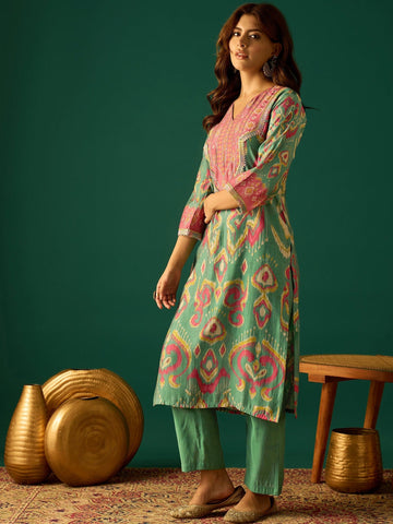 Elegant Sea Green Ikat Printed Straight-Fit Kurta With A V-Neck, Paired With Solid Ankle-Length Trousers For A Refined Ethnic Look