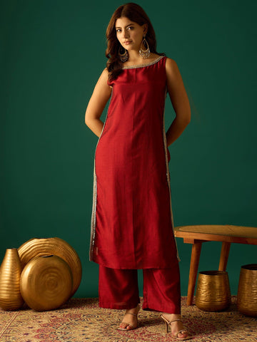 Sleeveless Maroon Straight-Fit Kurta With Mirror Lace Detailing And Boat Neck, Paired With Solid Ankle-Length Trousers For A Bold And Elegant Ethnic Look