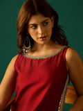 Sleeveless Maroon Straight-Fit Kurta With Mirror Lace Detailing And Boat Neck, Paired With Solid Ankle-Length Trousers For A Bold And Elegant Ethnic Look