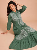 Green Embroidered Dress Featuring Bold Spiral Thread Work