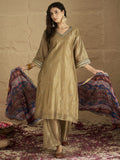 Varanga Women Radiate Festive Charm In This Gold Shimmer Kurta Set With Intricate Lace Detailing, Solid Ankle-Length Trousers, And Printed Dupatta.