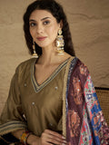 Varanga Women Radiate Festive Charm In This Gold Shimmer Kurta Set With Intricate Lace Detailing, Solid Ankle-Length Trousers, And Printed Dupatta.
