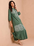 Green Embroidered Dress Featuring Bold Spiral Thread Work