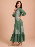 Green Embroidered Dress Featuring Bold Spiral Thread Work