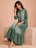Green Embroidered Dress Featuring Bold Spiral Thread Work
