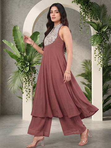 Varanga Women Nude Yoke Embroidered Sleeveless Flared Kurta With Trousers.