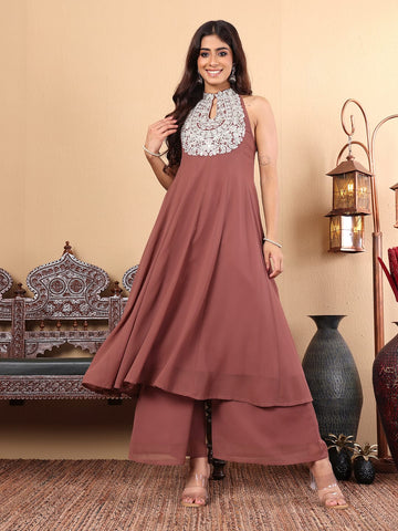 Varanga Women Nude Yoke Embroidered Sleeveless Flared Kurta With Trousers.