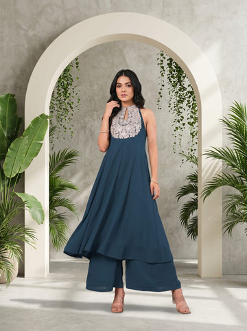Varanga Women Blue Yoke Embroidered Sleeveless Flared Kurta With Trousers.