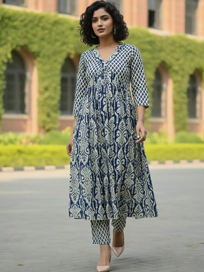 Classic ikat print Aliya-cut kurta in blue and white, teamed with regular-fit ankle-length trousers.