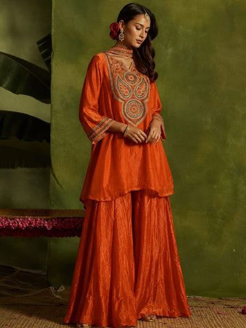 Rust Yoke Embroidered Kurta With Flared Sharara And Dupatta.