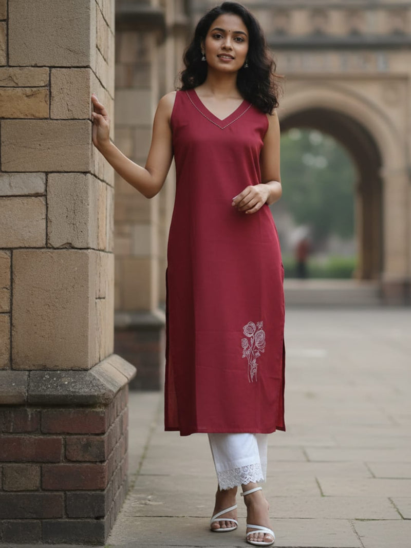 Sleeveless Solid Kurta with V-Neck and Subtle Floral Embroidery paired with trouser