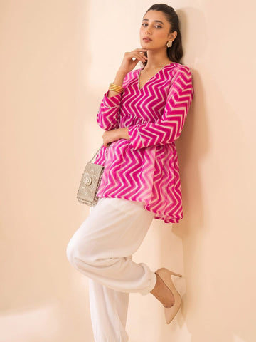Fuchsia Chevron-Print Peplum Top.