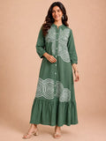 Green Embroidered Dress Featuring Bold Spiral Thread Work