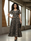 Varanga Womenâ€™s Ethnic Floral Printed Brown Flared Dress featuring a V-Neck and Flared Sleeves.
