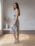 A floral-printed knee-length dress with v neckline perfect for turning heads from brunch to evening outings.