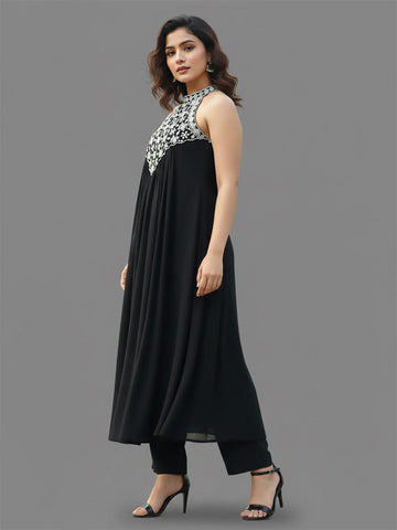Black halter-neck A-line kurta featuring delicate white floral embroidery with matching solid trousers.