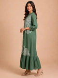 Green Embroidered Dress Featuring Bold Spiral Thread Work