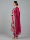Fuchsia kurta set featuring a bead-embellished yoke, solid ankle-length trousers, and a brocade dupatta