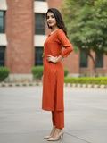 Solid straight-fit kurta with graceful embroidery and a round neckline, paired with full-length elasticated straight trousers.