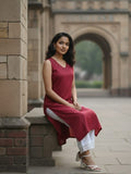 Sleeveless Solid Kurta with V-Neck and Subtle Floral Embroidery paired with trouser