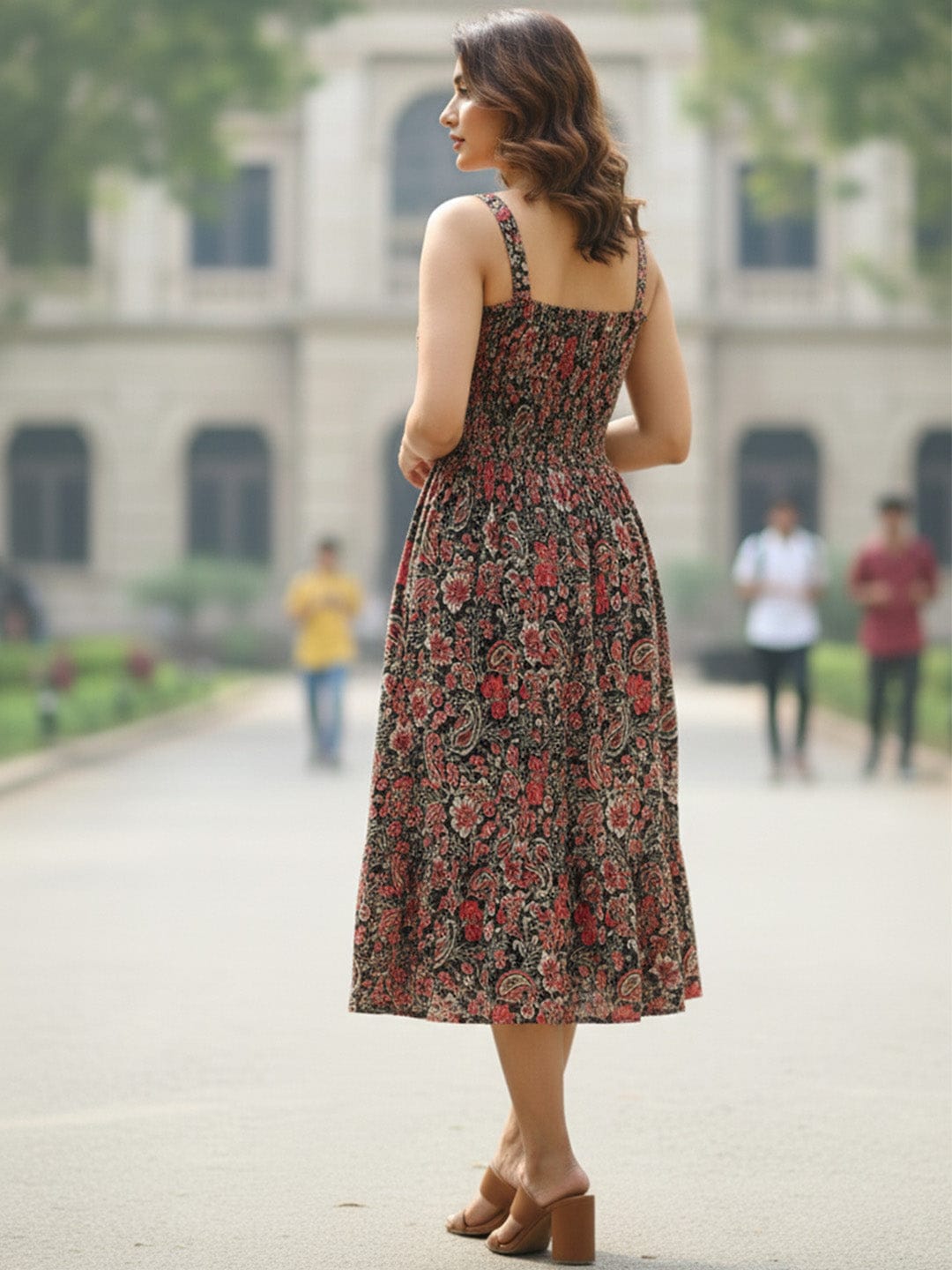 smocked printed sleeveless a line dress Black Floral Printed Sleeveless A-Line Dress with Halter Neck and Smoc – Varanga