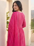 Bandhani-Printed Fuchsia Anarkali With Zari-Embroidered Yoke, Paired With Solid Trousers And Dupatta .
