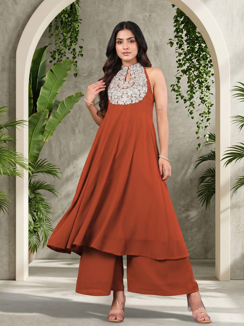 Varanga Women Rust Yoke Embroidered Sleeveless Flared Kurta With Trousers.