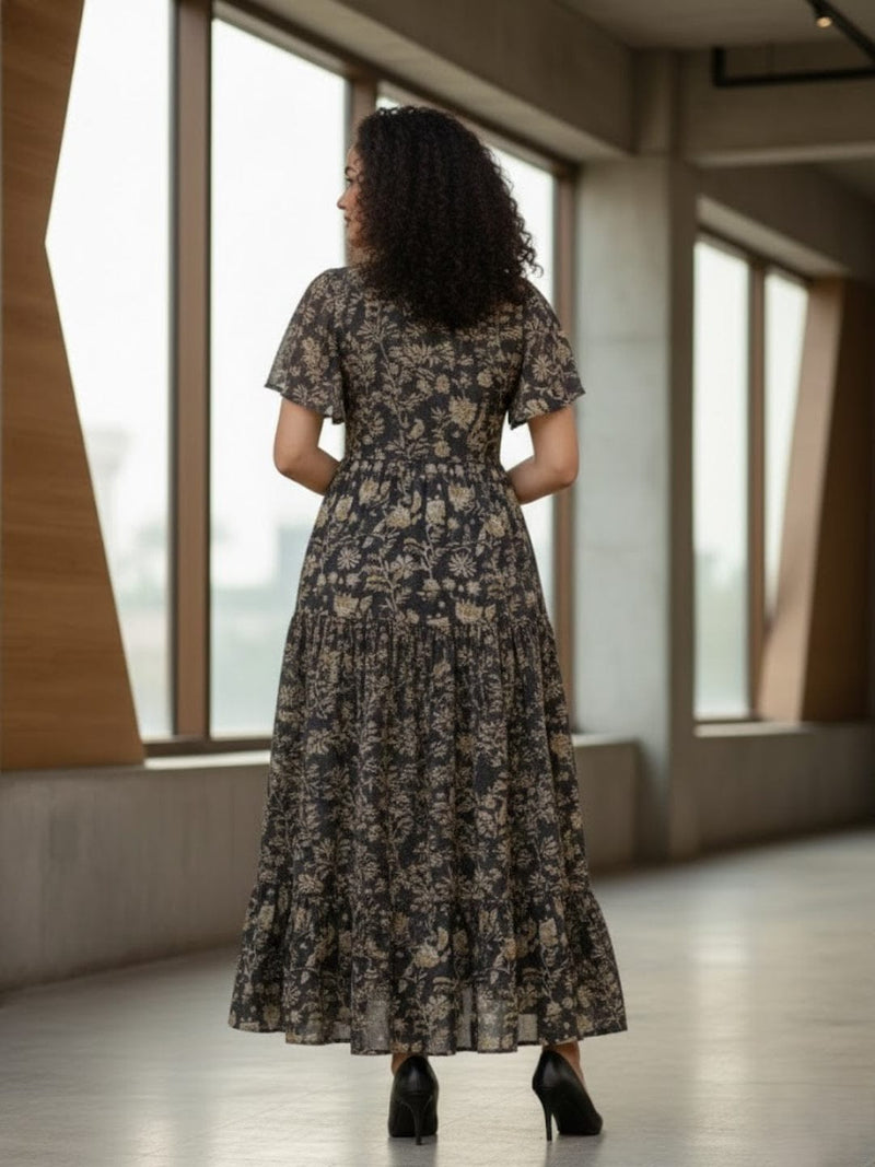 Varanga Women's Ethnic Floral Printed Brown Flared Dress featuring a V-Neck and Flared Sleeves.