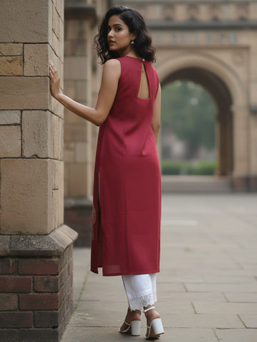 Sleeveless Solid Kurta with V-Neck and Subtle Floral Embroidery paired with trouser