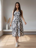 A floral-printed knee-length dress with v neckline perfect for turning heads from brunch to evening outings.