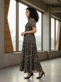 Varanga Womenâ€™s Ethnic Floral Printed Brown Flared Dress featuring a V-Neck and Flared Sleeves.