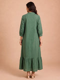 Green Embroidered Dress Featuring Bold Spiral Thread Work