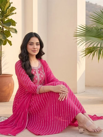 Bandhani-Printed Fuchsia Anarkali With Zari-Embroidered Yoke, Paired With Solid Trousers And Dupatta .