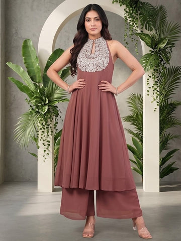 Varanga Women Nude Yoke Embroidered Sleeveless Flared Kurta With Trousers.