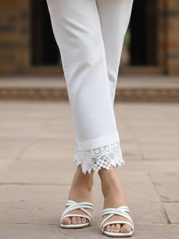 Sleeveless Solid Kurta with V-Neck and Subtle Floral Embroidery paired with trouser