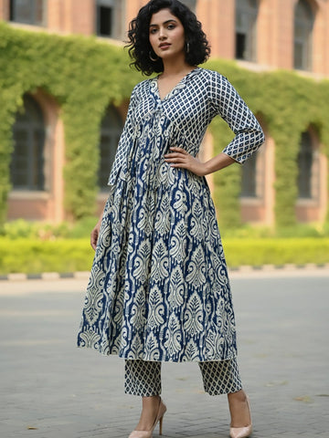 Classic ikat print Aliya-cut kurta in blue and white, teamed with regular-fit ankle-length trousers.