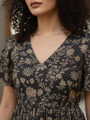 Varanga Women's Ethnic Floral Printed Brown Flared Dress featuring a V-Neck and Flared Sleeves.