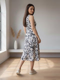 A floral-printed knee-length dress with v neckline perfect for turning heads from brunch to evening outings.