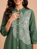 Green Embroidered Dress Featuring Bold Spiral Thread Work