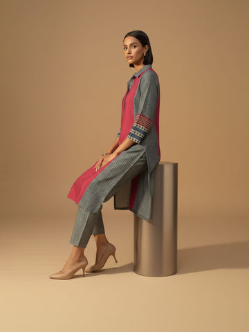 Classic red printed kurta with mandarin neckline and ankle-length elasticated trousers for effortless charm.