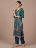 varanga Women A Vibrant 3-Piece Blue Ikat-Printed Kurta Set With Solid Trousers And A Lace-Trimmed Dupattaâ€”Perfect For Festive Occasions, Styled Best With Jhumkas, Juttis, And Soft Glam Makeup.