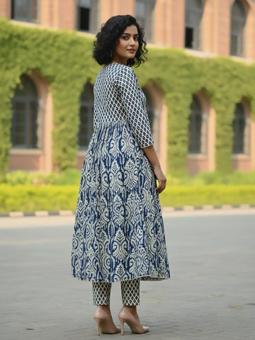 Classic ikat print Aliya-cut kurta in blue and white, teamed with regular-fit ankle-length trousers.