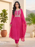Bandhani-Printed Fuchsia Anarkali With Zari-Embroidered Yoke, Paired With Solid Trousers And Dupatta .