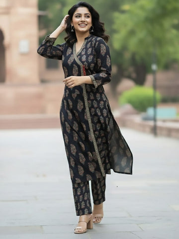 Angrakha-fit printed kurta set with mandarin collar and three-quarter sleeves, matched with straight trousers.