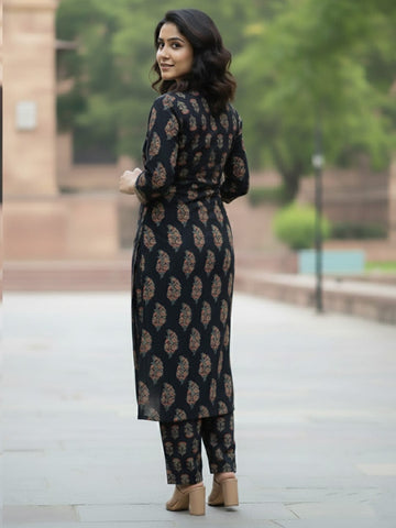 Angrakha-fit printed kurta set with mandarin collar and three-quarter sleeves, matched with straight trousers.